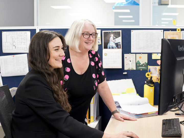 Image of Corcoran French law firm team in the Christchurch office enjoying their jobs.